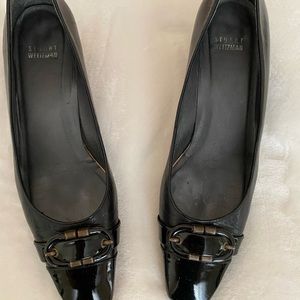 Stuart Weitzman black all leather with patent tip and patent wedge heal. Size 10